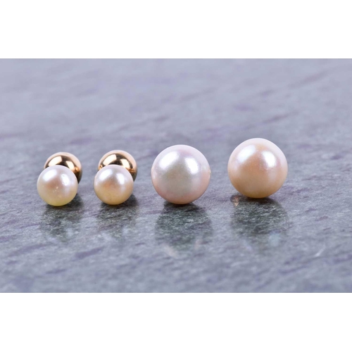 642 - A pair of reversable pearl and gold stud earrings (to wear either way), together with a pair of pear... 