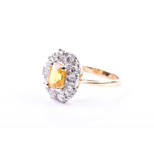 644 - A diamond and yellow sapphire cluster ring, set with a mixed rectangular-cut yellow sapphire of appr... 