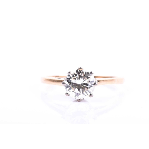 665 - An 18ct yellow gold and solitaire diamond ring, set with a round brilliant-cut diamond of approximat... 