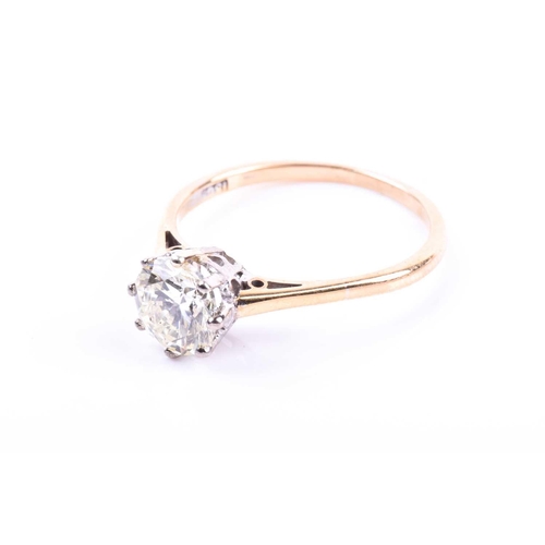 665 - An 18ct yellow gold and solitaire diamond ring, set with a round brilliant-cut diamond of approximat... 