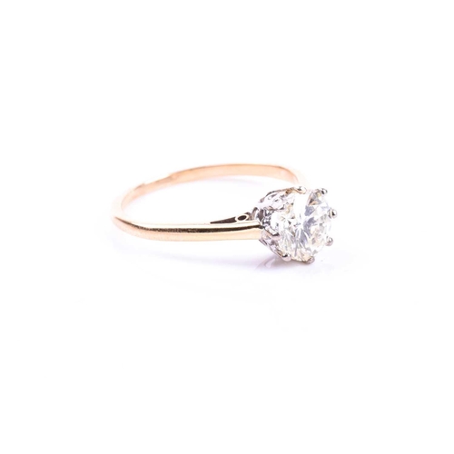 665 - An 18ct yellow gold and solitaire diamond ring, set with a round brilliant-cut diamond of approximat... 