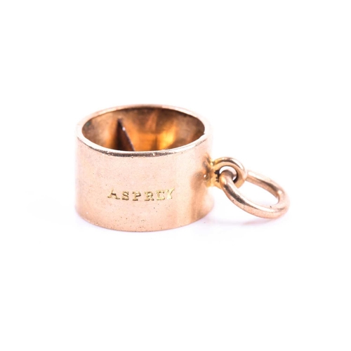 669 - Asprey & Co. An unusual novelty 9ct yellow gold pendant in the form of a small cigar cutter, 12 mm d... 