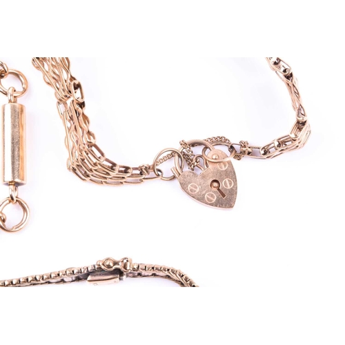 673 - An unusual 9ct yellow gold barrel-link bracelet, together with a 9ct yellow gold tapered gate-link b... 