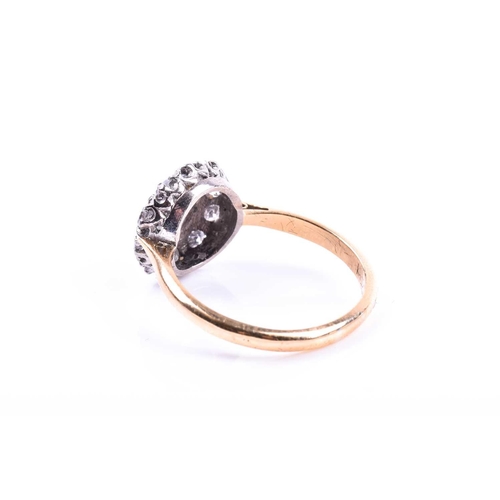 693 - An 18ct yellow gold and diamond cluster ring, centred with a round-cut diamond of approximately 0.33... 