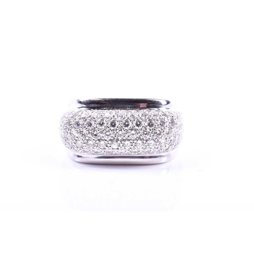 697 - An unusual diamond cocktail ring, pave-set with round brilliant-cut diamonds on an angular mount, in... 