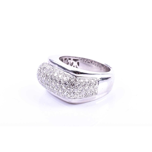 697 - An unusual diamond cocktail ring, pave-set with round brilliant-cut diamonds on an angular mount, in... 