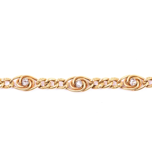 700 - A yellow gold and diamond bracelet, set with three knotted segments inset with a diamond accent each... 