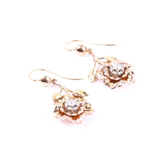 704 - A pair of antique yellow gold and diamond floral earrings, each earring inset with an old-cut diamon... 