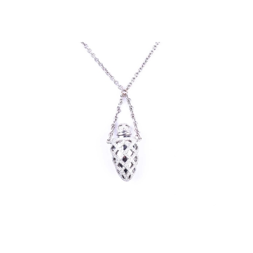 716 - An 18ct white gold and diamond Theo Fennell 'Ampoule' pendant, the bottle pendant with lattice desig... 