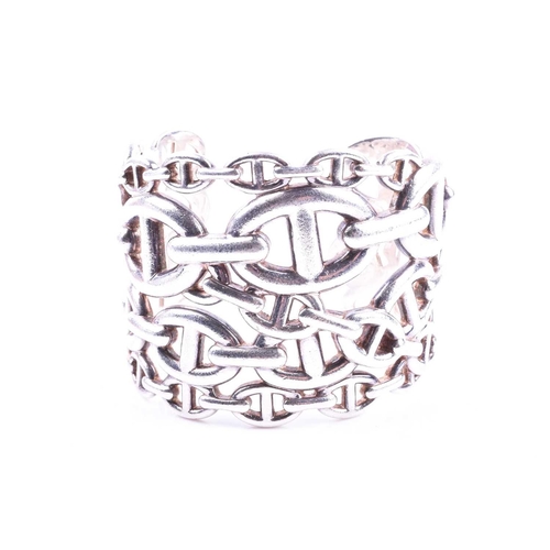 717 - Hermes. A Farandole cuff bangle, the rigid chaine d'ancre links in over-laid pattern, 5cm inner diam... 