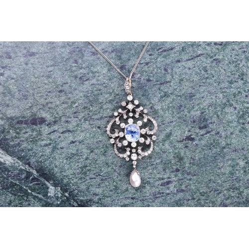 729 - An impressive diamond, sapphire, and pearl pendant, the openwork mount centred with a cushion-cut Ce... 