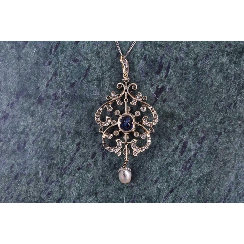 729 - An impressive diamond, sapphire, and pearl pendant, the openwork mount centred with a cushion-cut Ce... 