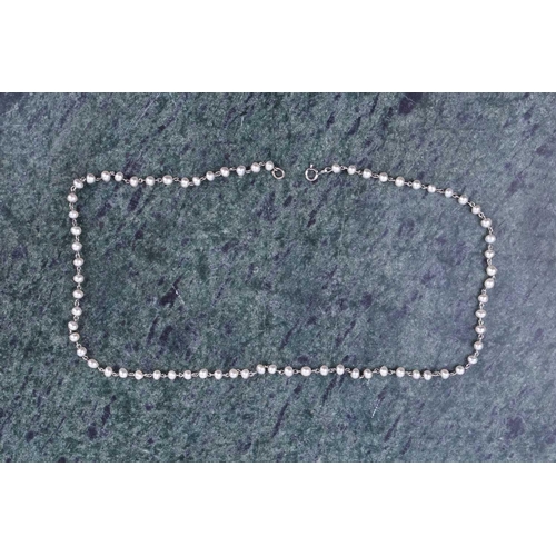 732 - A platinum and pearl necklace, set with small pearls, unmarked (tests as platium), 42 cm long, 7 gra... 