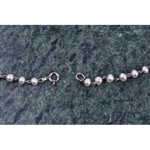 732 - A platinum and pearl necklace, set with small pearls, unmarked (tests as platium), 42 cm long, 7 gra... 