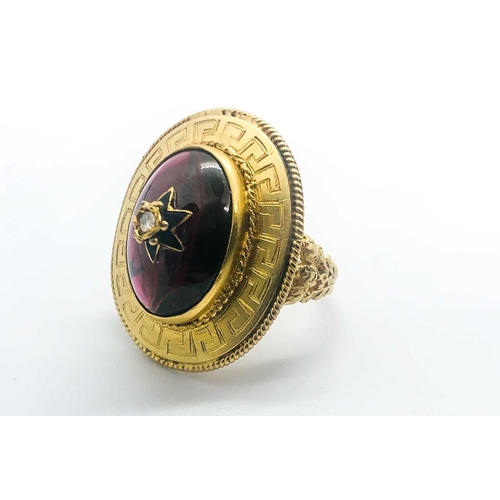 736 - A yellow gold and garnet ring, centred with an oval cabochon garnet, inset with rose-cut diamond and... 