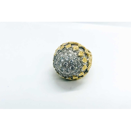 737 - An 18ct yellow gold and diamond bombe ring, by Birks, the rounded bombe mount inset with round brill... 