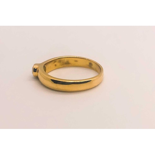 745 - An 18ct yellow gold and diamond ring, collet-set with a round-cut diamond of approximately 0.20 cara... 