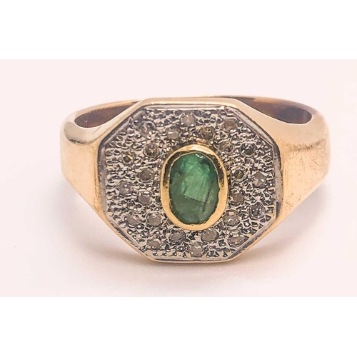 747 - A yellow gold, diamond, and emerald ring, set with a small oval emerald within a pave-set diamond mo... 