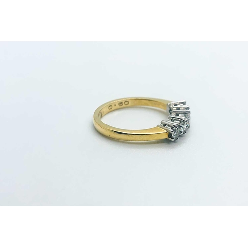 752 - An 18ct yellow gold and diamond ring, set with five diamonds of approximately 0.50 carats combined, ... 