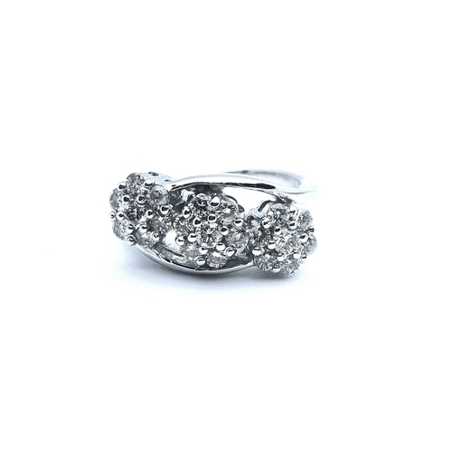 757 - An 18ct white gold and diamond crossover ring, set with three clusters of round brilliant-cut diamon... 