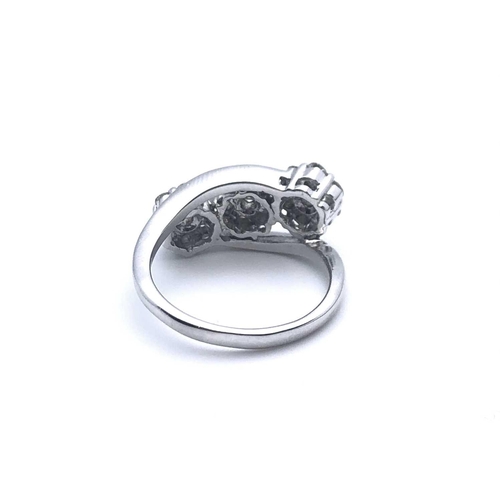 757 - An 18ct white gold and diamond crossover ring, set with three clusters of round brilliant-cut diamon... 