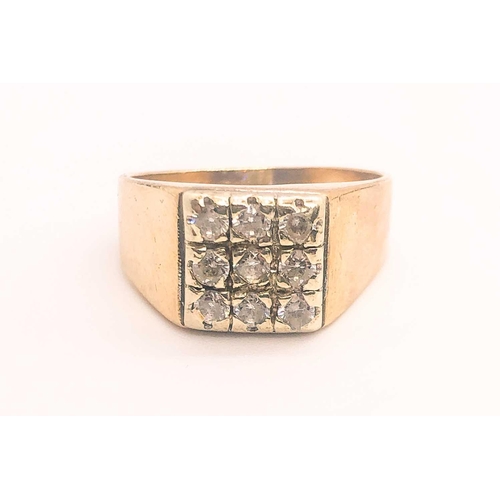 767 - A 9ct yellow gold and cubic zirconia gents ring, set with nine round-cut CZs, size S, 5.5 grams.