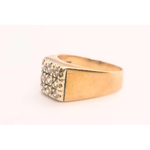 767 - A 9ct yellow gold and cubic zirconia gents ring, set with nine round-cut CZs, size S, 5.5 grams.