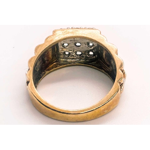 772 - A 9ct yellow gold and diamond gents ring, in the style of a Rolex strap, inset with nine small round... 