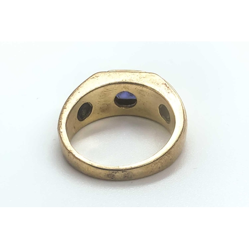 778 - A 9ct yellow gold and tanzanite ring, the tapered ring mount inset with a square-cut tanzanite and f... 