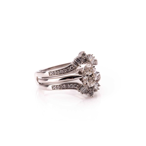 781 - A 14ct white gold and mixed oval-cut solitaire diamond ring, the oval-cut diamond of approximately 0... 