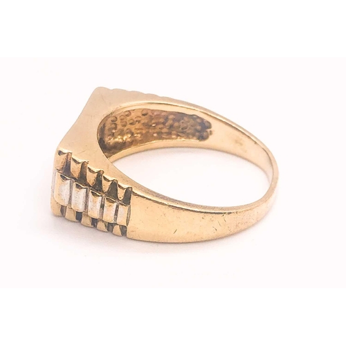 787 - A 9ct yellow gold and CZ gents ring, the oblong mount inset with fifteen round CZs, grain-set, with ... 