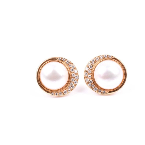 674A - A pair of 18ct gold, diamond and mabe pearl earrings; with two rows of crescent shaped round brillia... 