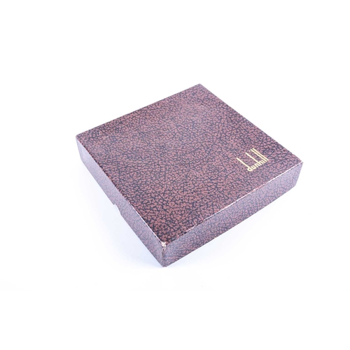 488A - Dunhill: A brown suede photograph frame, in fitted presentation box, 17.5cm sq