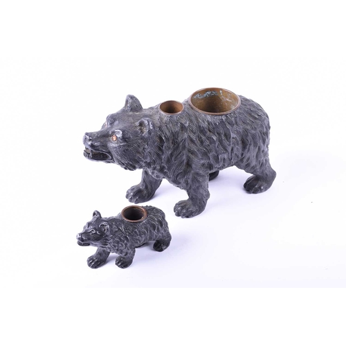 504A - Large late Victorian bronzed spelter novelty inkstand, modelled in the form of a bear, with glass ey... 