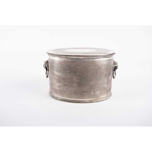 578A - Regency electroplated biscuit barrel, oval form, the flush-hinged cover opens to reveal a divider, l... 