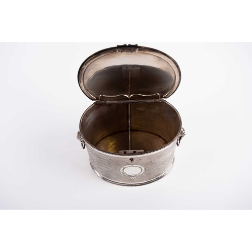 578A - Regency electroplated biscuit barrel, oval form, the flush-hinged cover opens to reveal a divider, l... 