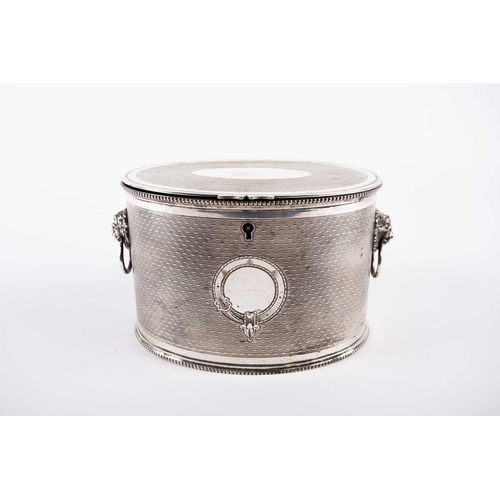 578A - Regency electroplated biscuit barrel, oval form, the flush-hinged cover opens to reveal a divider, l... 