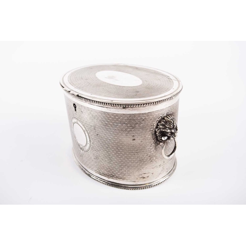 578A - Regency electroplated biscuit barrel, oval form, the flush-hinged cover opens to reveal a divider, l... 