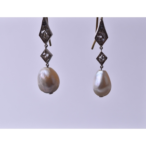 720 - A pair of diamond and natural pearl drop earrings, each with two diamond-shaped mounts inset with ol... 