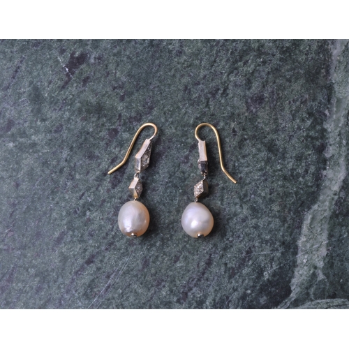 720 - A pair of diamond and natural pearl drop earrings, each with two diamond-shaped mounts inset with ol... 