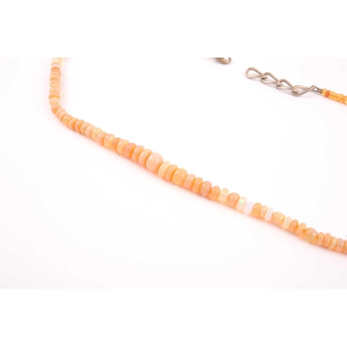 10 - A opal bead necklace, the graduated roundels to a base metal clasp; 44cmCondition report: varying to... 