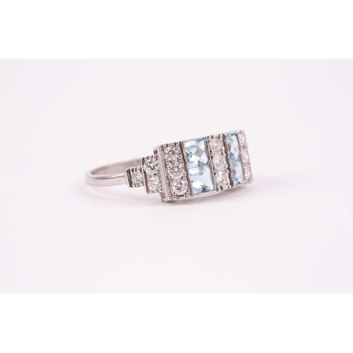 106 - A platinum, diamond, and aquamarine ring, set with four mixed square-cut aquamarines interspersed wi... 