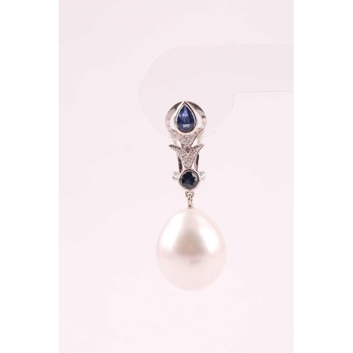 107 - A pair of South Sea pearl, diamond and sapphire drop earrings, the pearl approximately 16.5 mm high,... 