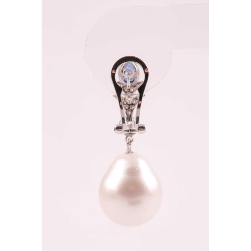 107 - A pair of South Sea pearl, diamond and sapphire drop earrings, the pearl approximately 16.5 mm high,... 