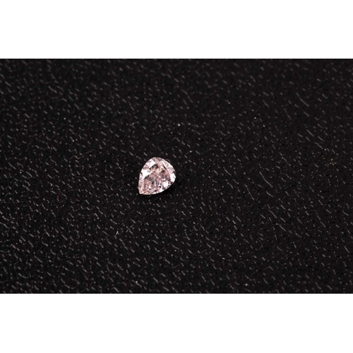 11 - § A loose mixed pear-cut diamond, approximately 0.19 carats, light pink colour, approximate clarity ... 