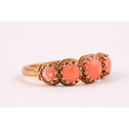 110 - A Georgian yellow gold and coral ring, set with five cabochon coral, shank unmarked, size O, 2.8 gra... 