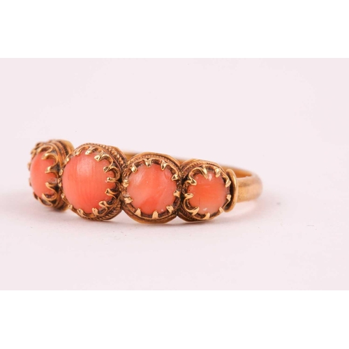 110 - A Georgian yellow gold and coral ring, set with five cabochon coral, shank unmarked, size O, 2.8 gra... 