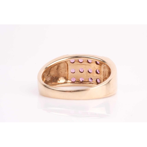 111 - A rectangular pink tourmaline cluster ring, in tapering 9ct gold shank. Size X, 7.7 grams