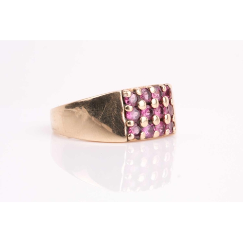 111 - A rectangular pink tourmaline cluster ring, in tapering 9ct gold shank. Size X, 7.7 grams