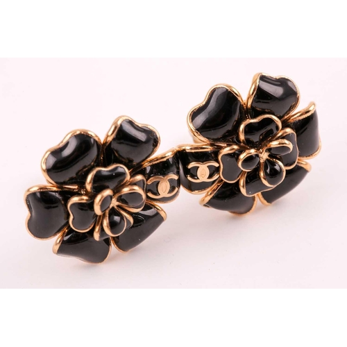 134 - Chanel. A pair of black Gripoix Camellia floral earrings, clip backs, approximately 3.2 cm diameter,... 